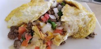 Omelet with pico and sausage